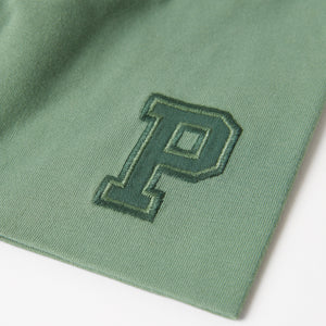 Organic Cotton Green Kids Beanie from the Polarn O. Pyret kidswear collection. Sustainably produced kids outerwear.