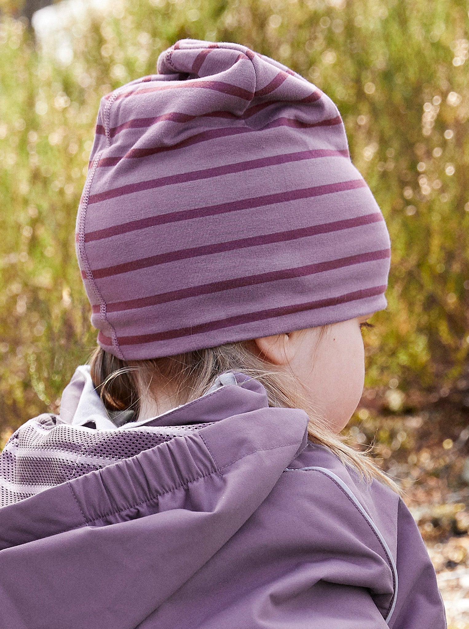 Purple Fleece Lined Kids Beanie Hat from the Polarn O. Pyret kidswear collection. The best ethical kids outerwear.