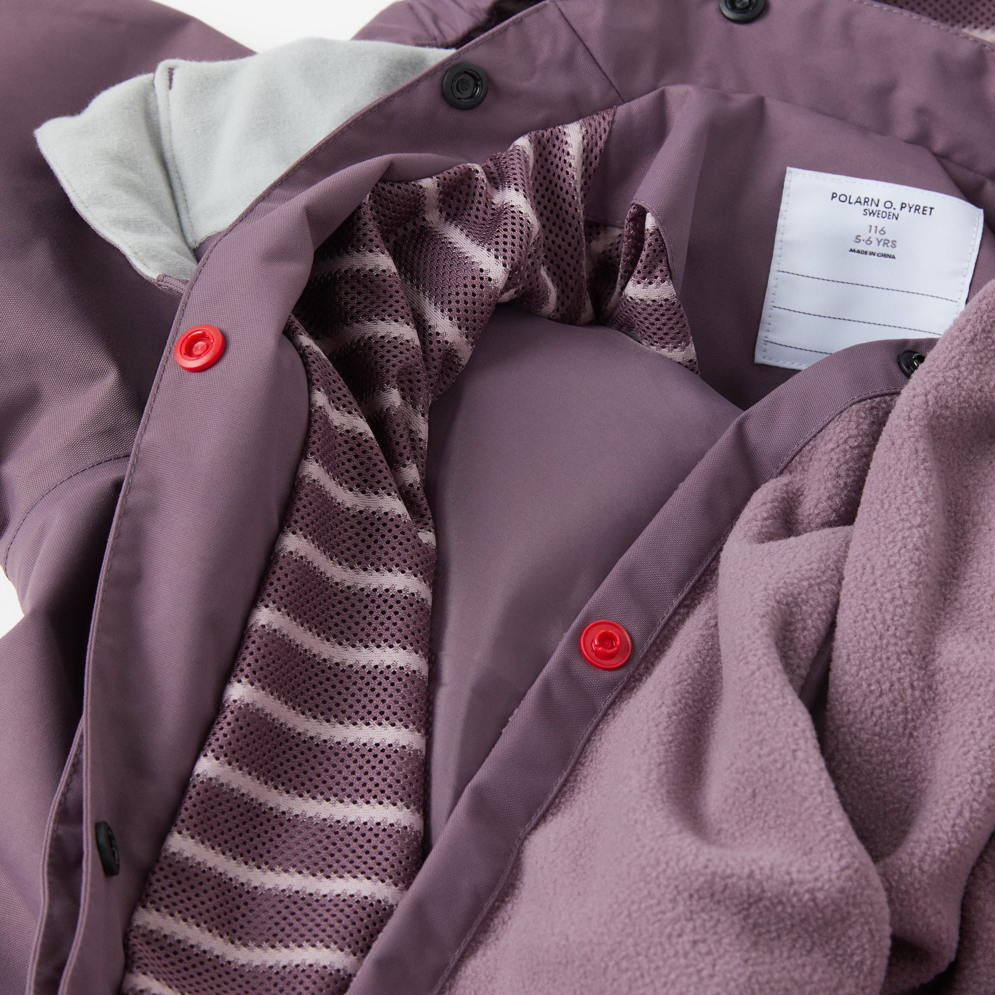 Purple Waterproof Kids Overall from the Polarn O. Pyret kidswear collection. The best ethical kids outerwear.