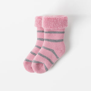 Terry Wool Pink Baby Socks from the Polarn O. Pyret kidswear collection. Sustainably produced kids outerwear.