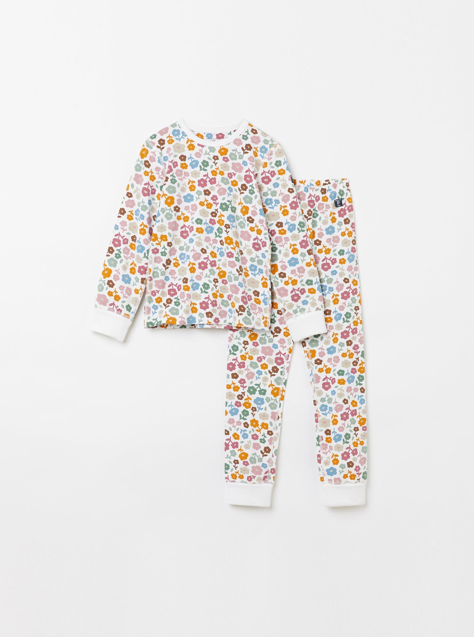 Organic Cotton Floral White Kids Pyjamas from the Polarn O. Pyret Kidswear collection. Nordic kids clothes made from sustainable sources.
