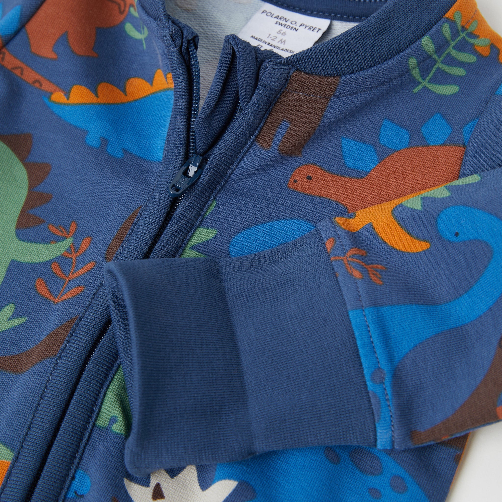 Dinosaur Print Blue Baby Romper from the Polarn O. Pyret Kidswear collection. Ethically produced kids clothing.