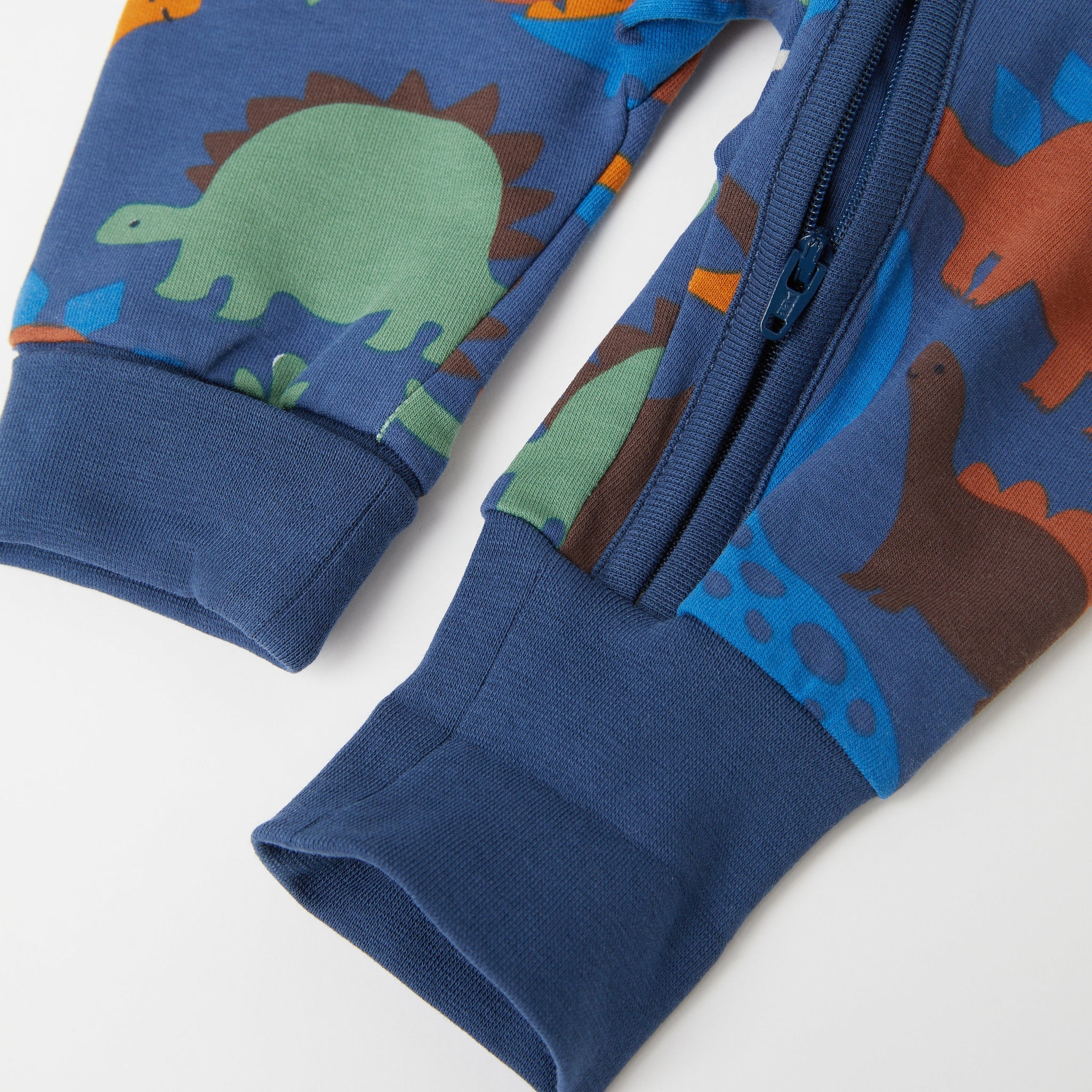 Dinosaur Print Blue Baby Romper from the Polarn O. Pyret Kidswear collection. Ethically produced kids clothing.