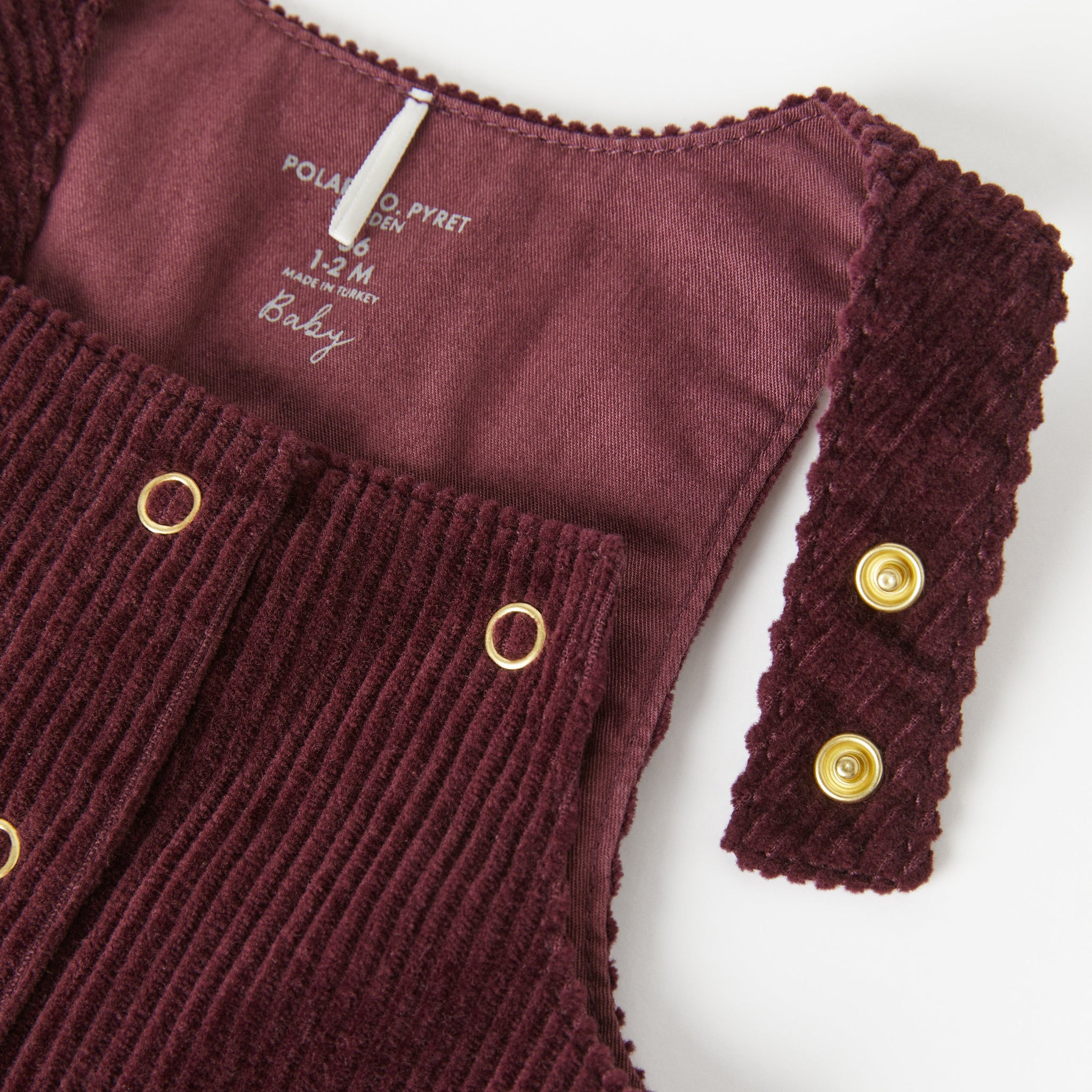 Corduroy Burgundy Baby Dress from the Polarn O. Pyret Kidswear collection. Ethically produced kids clothing.
