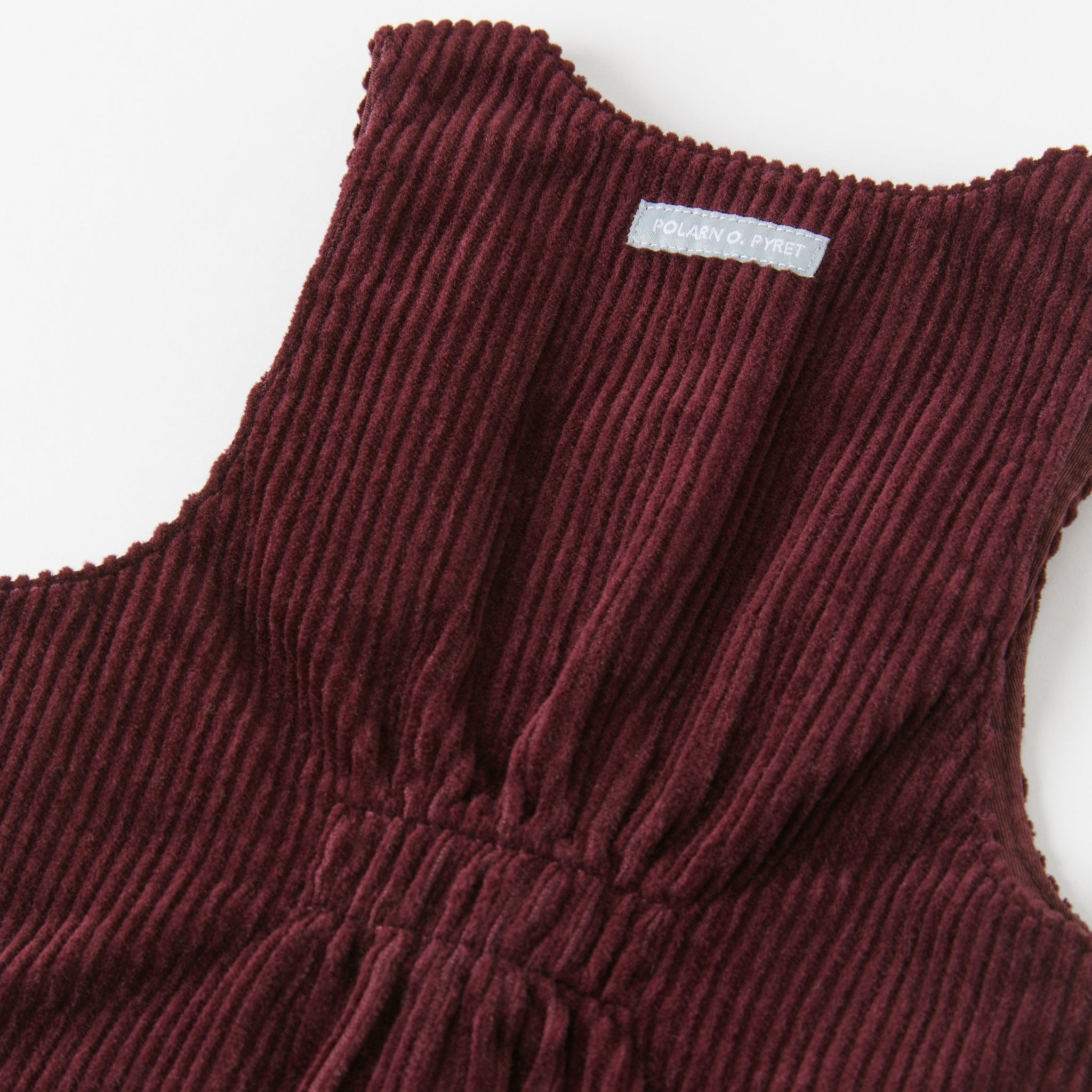 Corduroy Burgundy Baby Dress from the Polarn O. Pyret Kidswear collection. Ethically produced kids clothing.