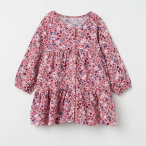 Organic Cotton Floral Baby Dress from the Polarn O. Pyret Kidswear collection. Nordic kids clothes made from sustainable sources.