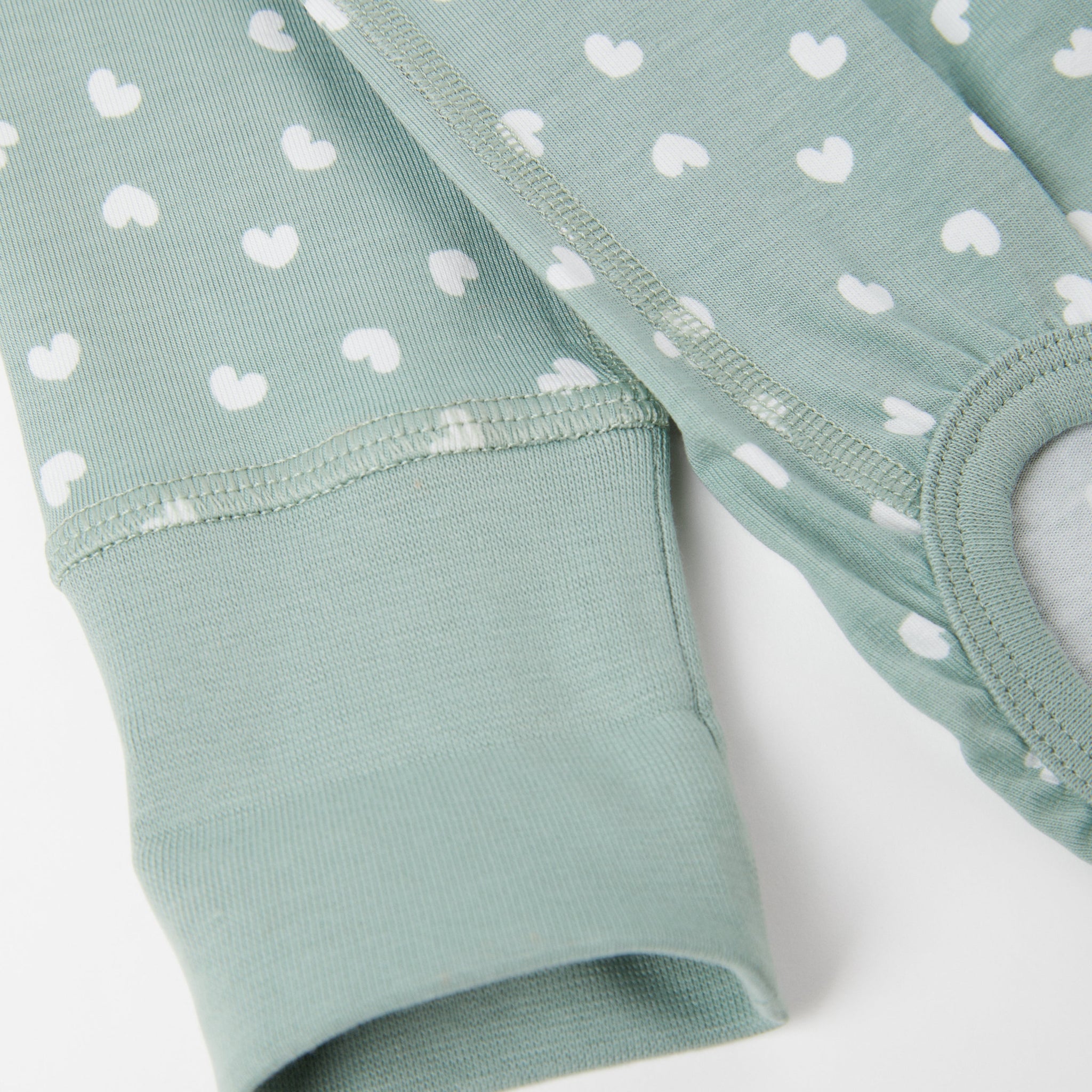 Organic Cotton Heart Print Babygrow from the Polarn O. Pyret Kidswear collection. Ethically produced kids clothing.
