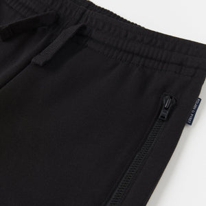 Organic Cotton Black Kids Joggers from the Polarn O. Pyret Kidswear collection. Ethically produced kids clothing.