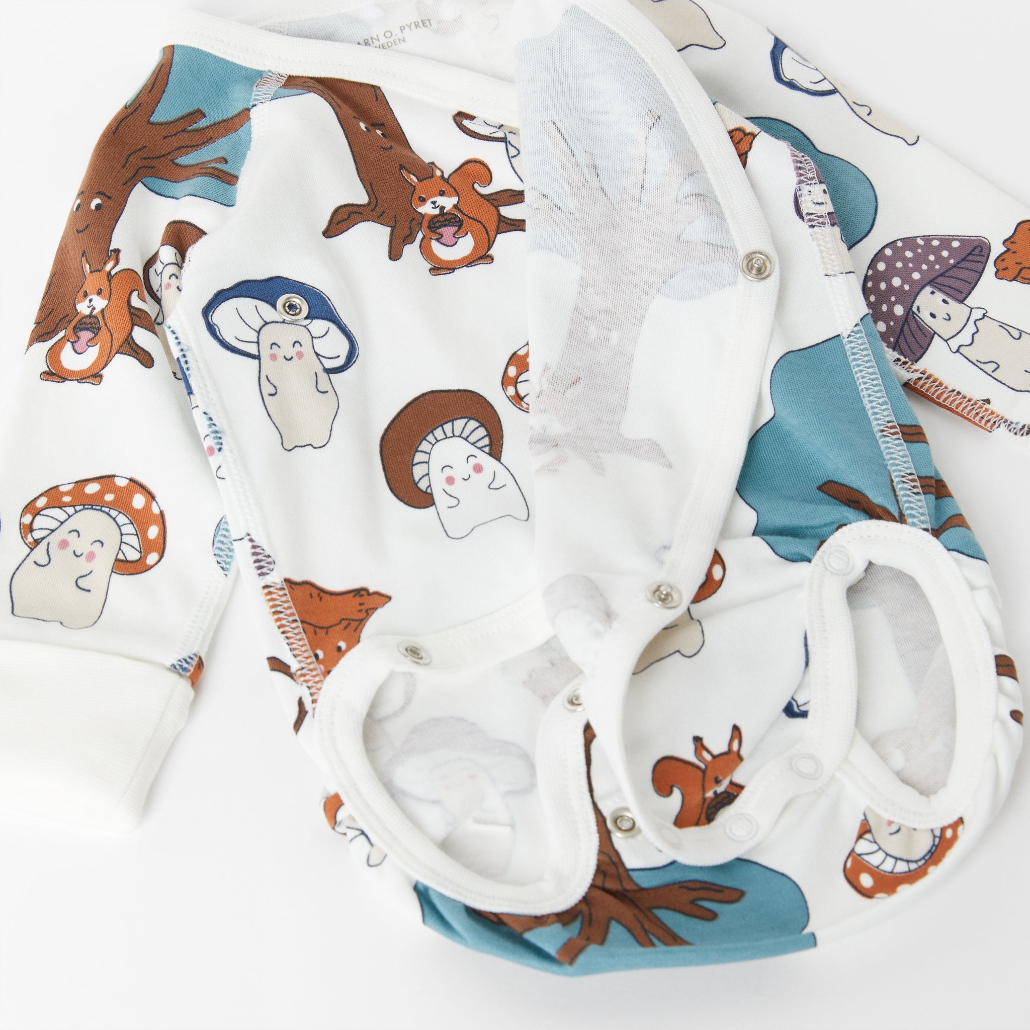 White Cotton Wraparound Babygrow from the Polarn O. Pyret babywear collection. The best ethical baby clothes