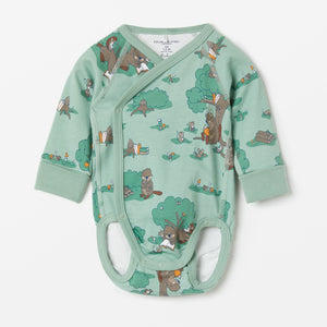 Green Cotton Wraparound Babygrow from the Polarn O. Pyret babywear collection. Nordic baby clothes made from sustainable sources.