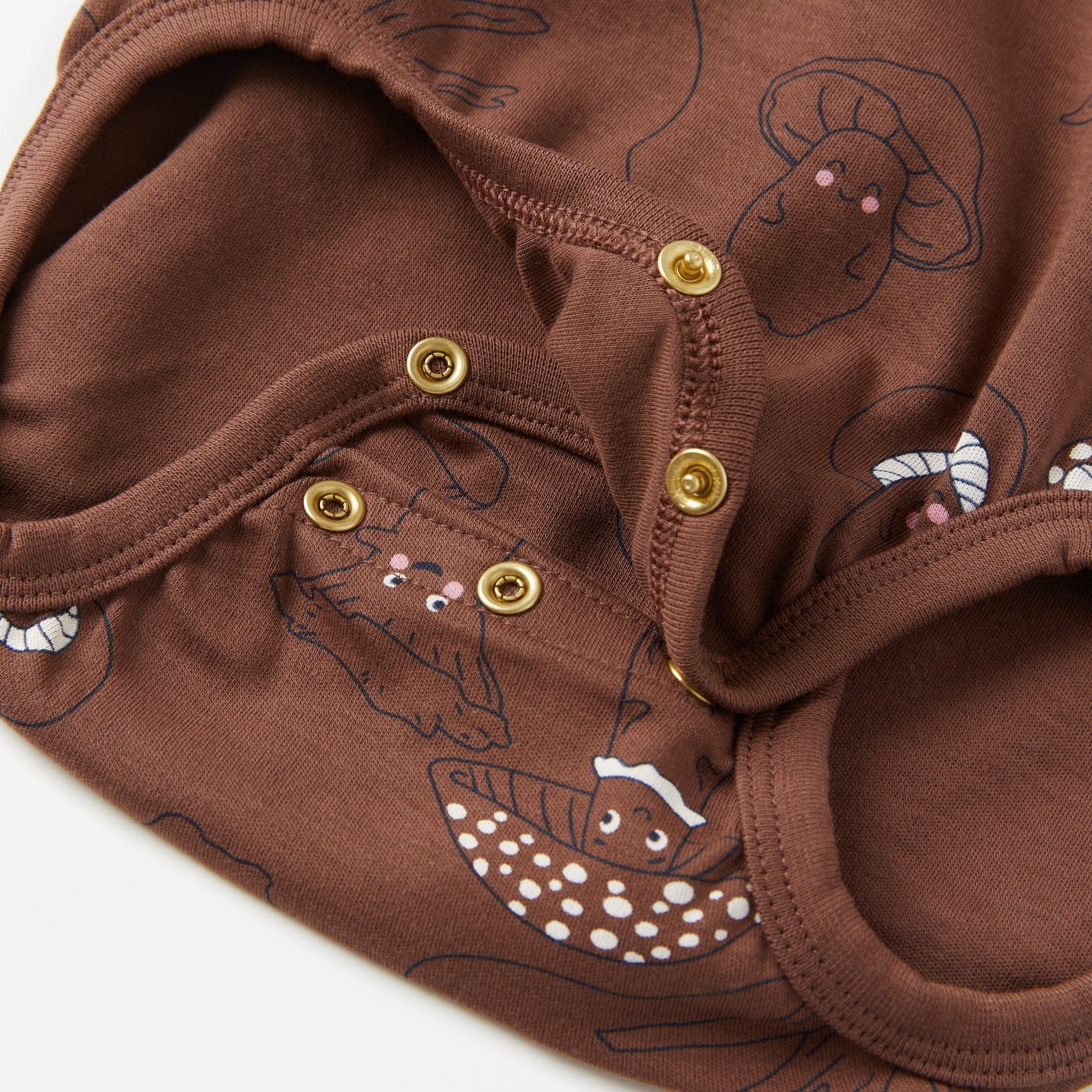 Brown Organic Cotton Babygrow from the Polarn O. Pyret babywear collection. Nordic baby clothes made from sustainable sources.