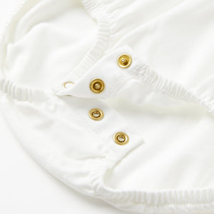 Organic Cotton Floral White Babygrow from the Polarn O. Pyret babywear collection. Clothes made using sustainably sourced materials.