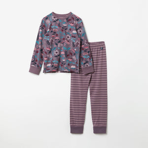 Purple Floral Print Kids Pyjamas from the Polarn O. Pyret kidswear collection. Clothes made using sustainably sourced materials.