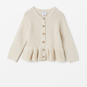 Ruffled White Knitted Baby Cardigan from the Polarn O. Pyret babywear collection. Ethically produced baby clothing.