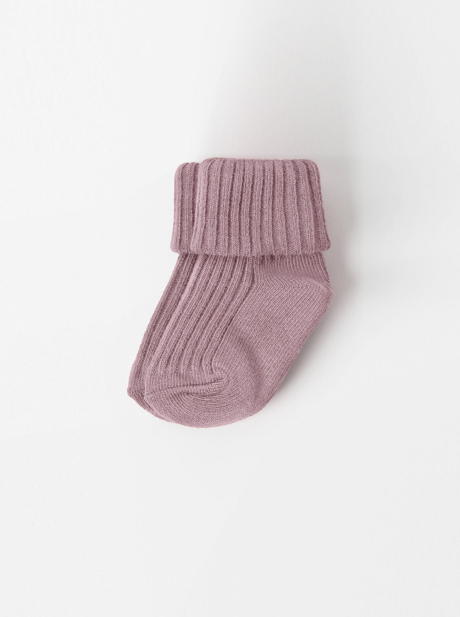 Soft Pink Baby Socks from the Polarn O. Pyret babywear collection. Nordic baby clothes made from sustainable sources.