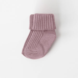 Soft Pink Baby Socks from the Polarn O. Pyret babywear collection. Nordic baby clothes made from sustainable sources.