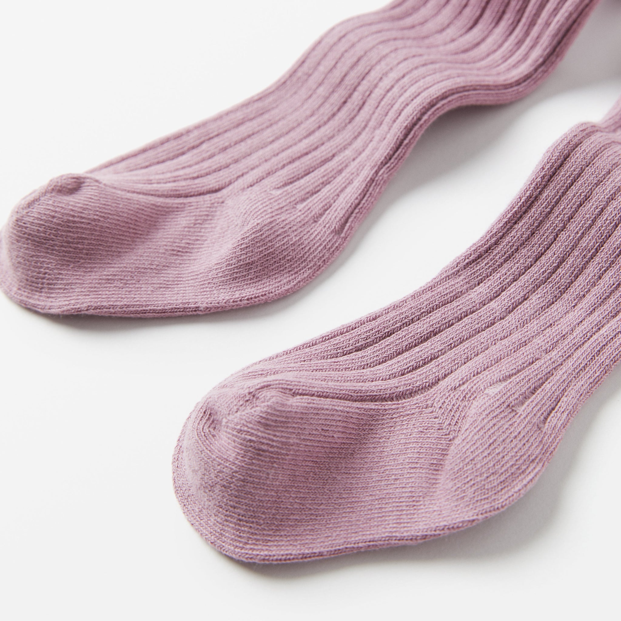Ribbed Cotton Pink Baby Tights from the Polarn O. Pyret babywear collection. Clothes made using sustainably sourced materials.
