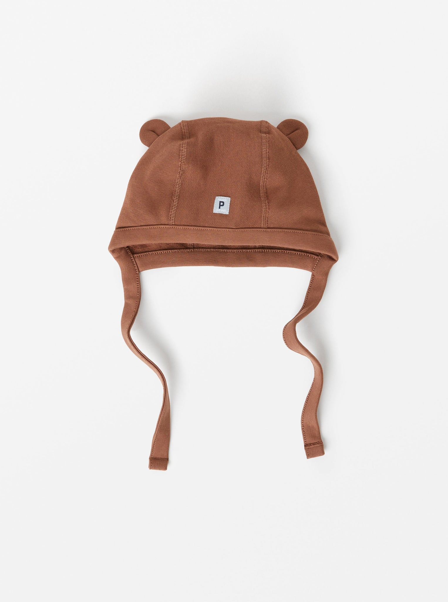 Brown Organic Cotton Baby Hat from the Polarn O. Pyret babywear collection. Clothes made using sustainably sourced materials.