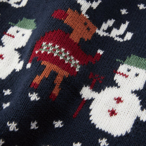 Organic Cotton Kids Christmas Jumper from the Polarn O. Pyret kidswear collection. Made using 100% GOTS Organic Cotton