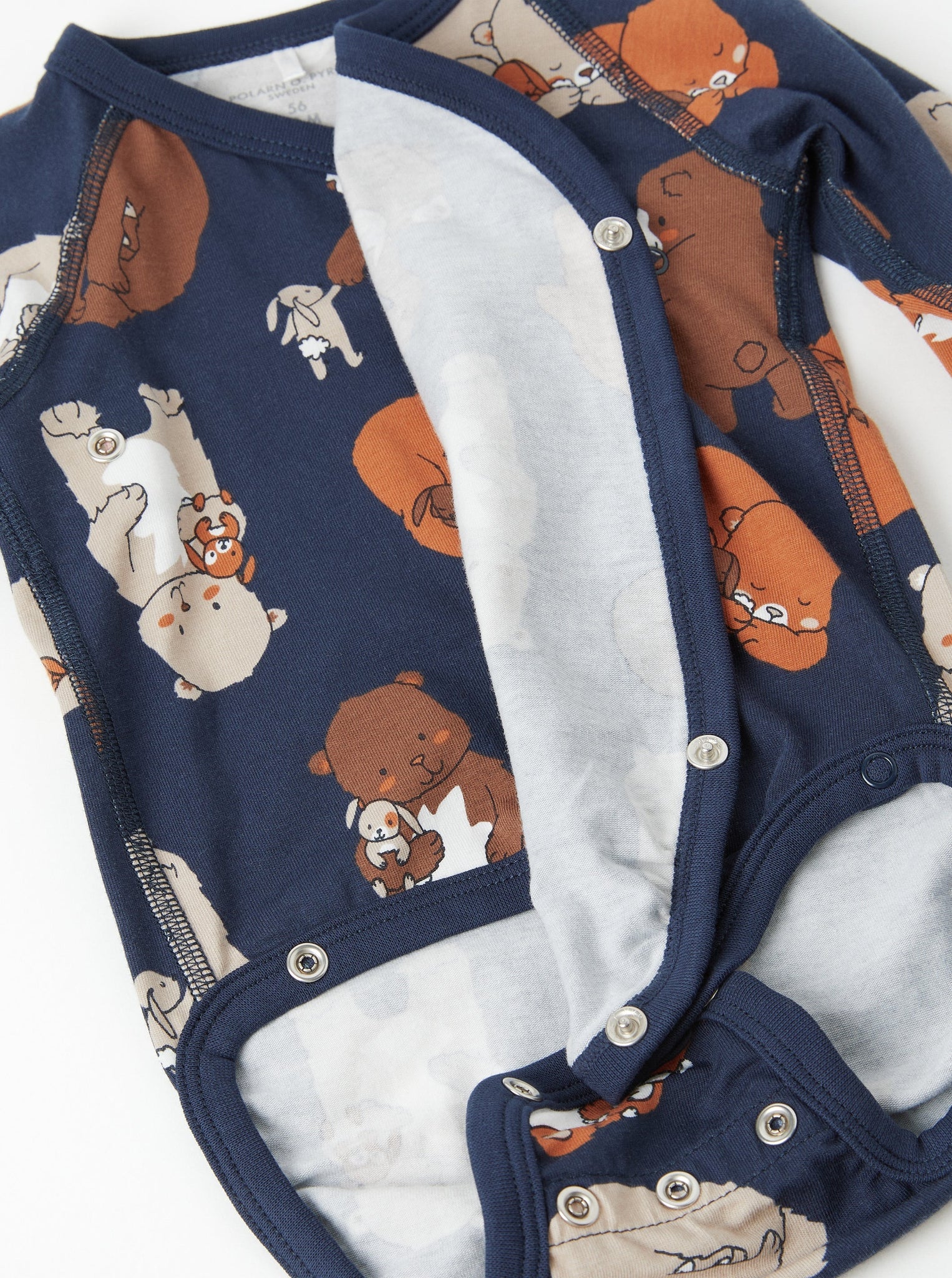 Sleepy Bear Print Wraparound Babygrow from the Polarn O. Pyret baby collection. The best ethical baby clothes