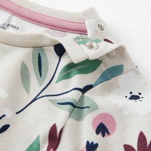 Organic Cotton Floral Print Baby Dress from the Polarn O. Pyret baby collection. Nordic baby clothes made from sustainable sources.