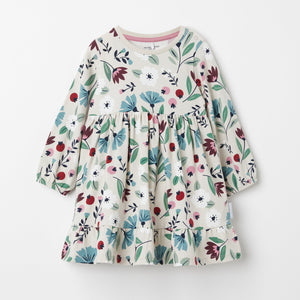 Organic Cotton Floral Print Baby Dress from the Polarn O. Pyret baby collection. Nordic baby clothes made from sustainable sources.