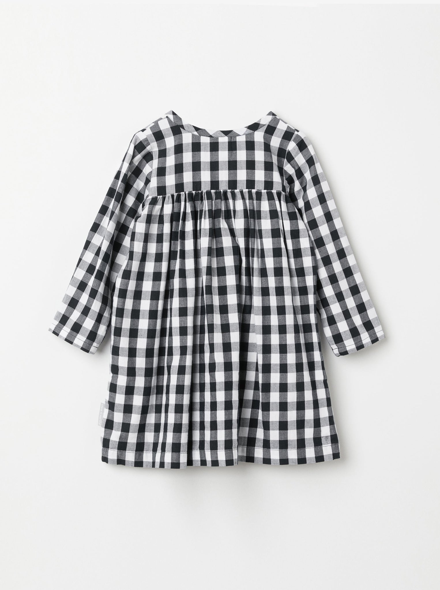 Organic Cotton Checked Baby Dress from the Polarn O. Pyret baby collection. Ethically produced baby clothing.