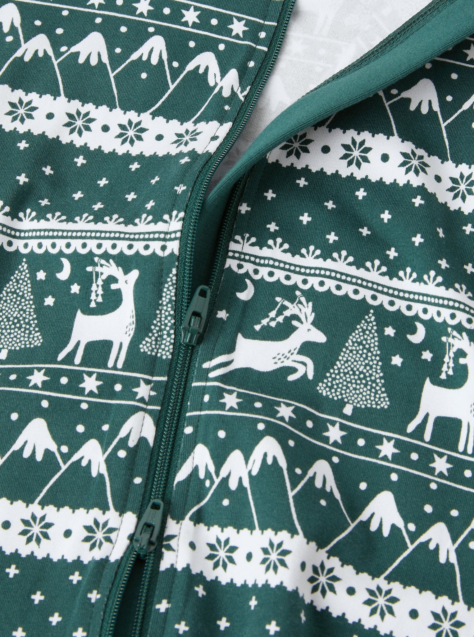 Green Christmas Print Baby Sleepsuit from the Polarn O. Pyret baby collection. Nordic baby clothes made from sustainable sources.