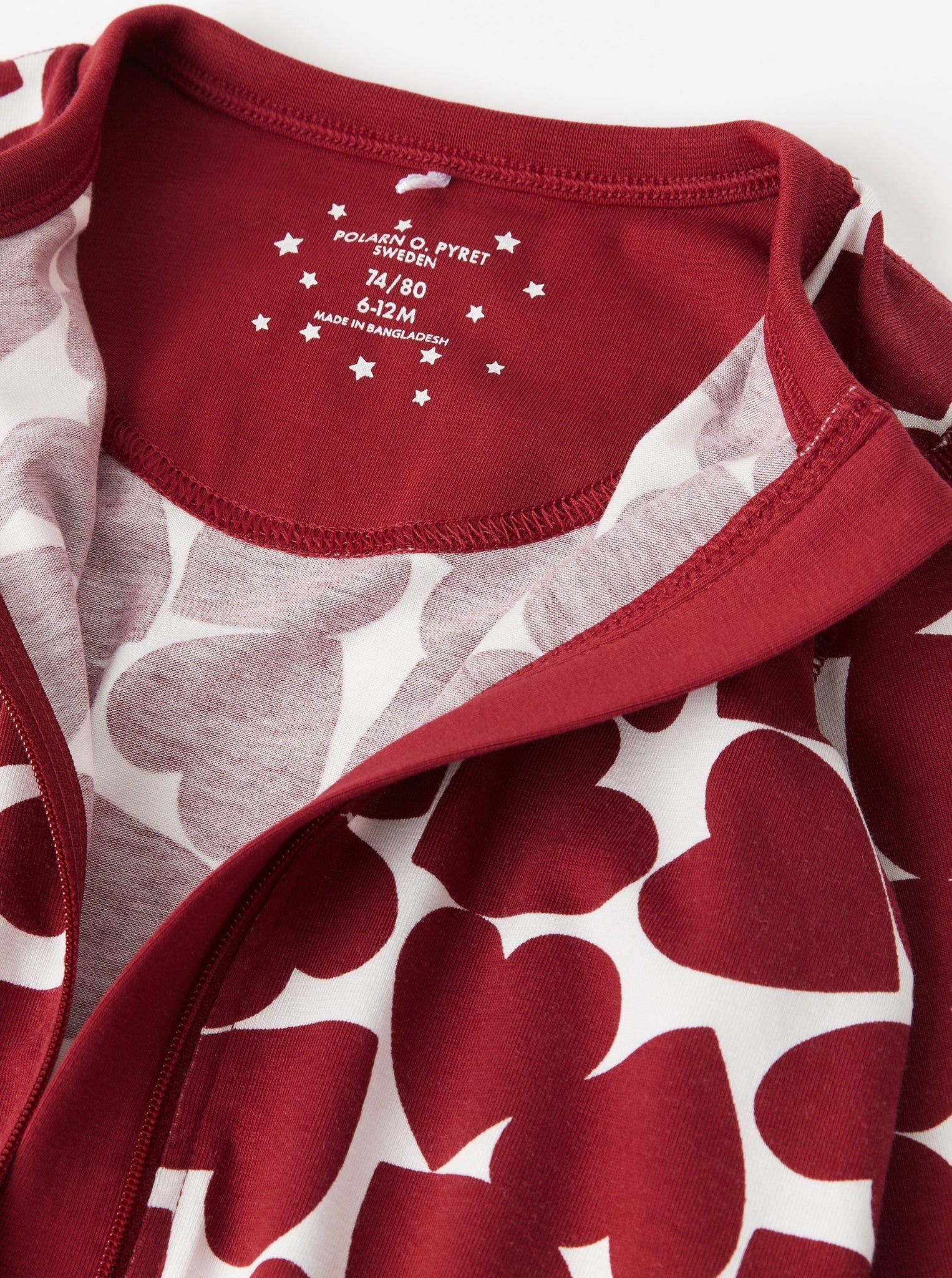 Heart Print Red Baby Sleepsuit from the Polarn O. Pyret baby collection. The best ethical baby clothes