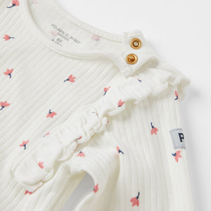 Organic Cotton Floral Babygrow from the Polarn O. Pyret babywear collection. Clothes made using sustainably sourced materials.