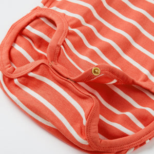Striped Organic Cotton Orange Babygrow from the Polarn O. Pyret babywear collection. Nordic baby clothes made from sustainable sources.