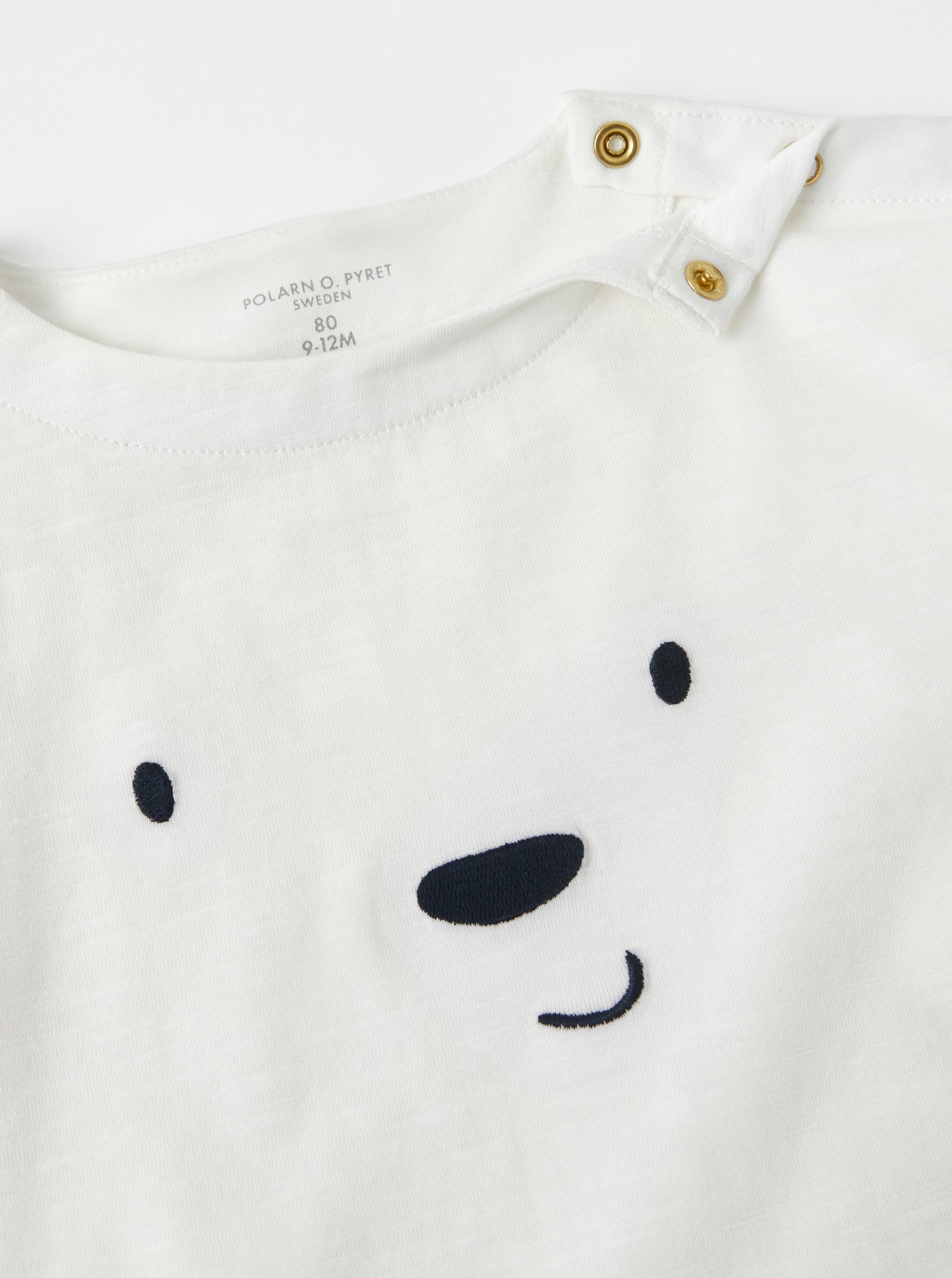 Organic Cotton White Baby Top from the Polarn O. Pyret babywear collection. Nordic kids clothes made from sustainable sources.