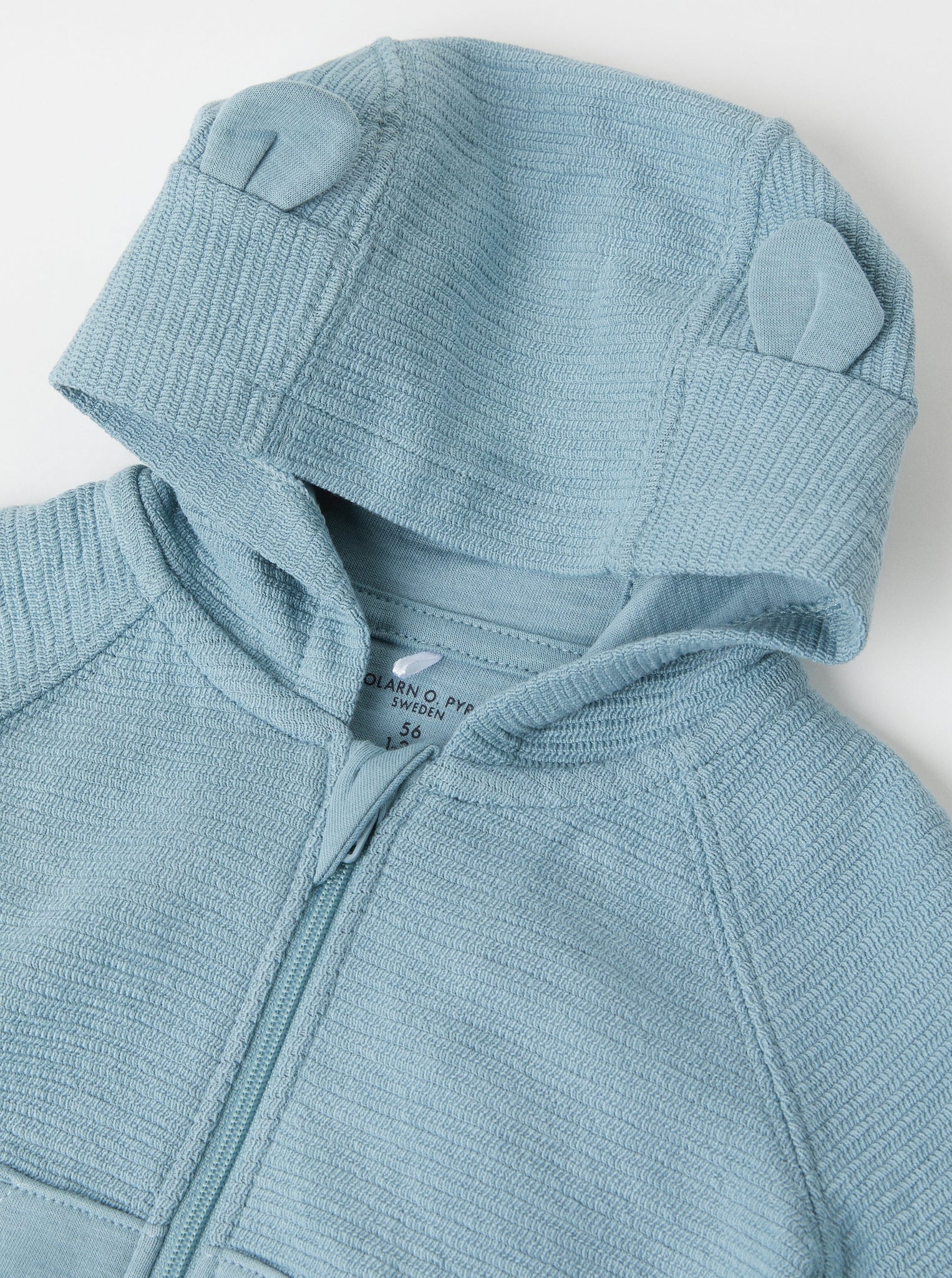 Organic Cotton Blue Baby Hoodie from the Polarn O. Pyret babywear collection. Nordic kids clothes made from sustainable sources.