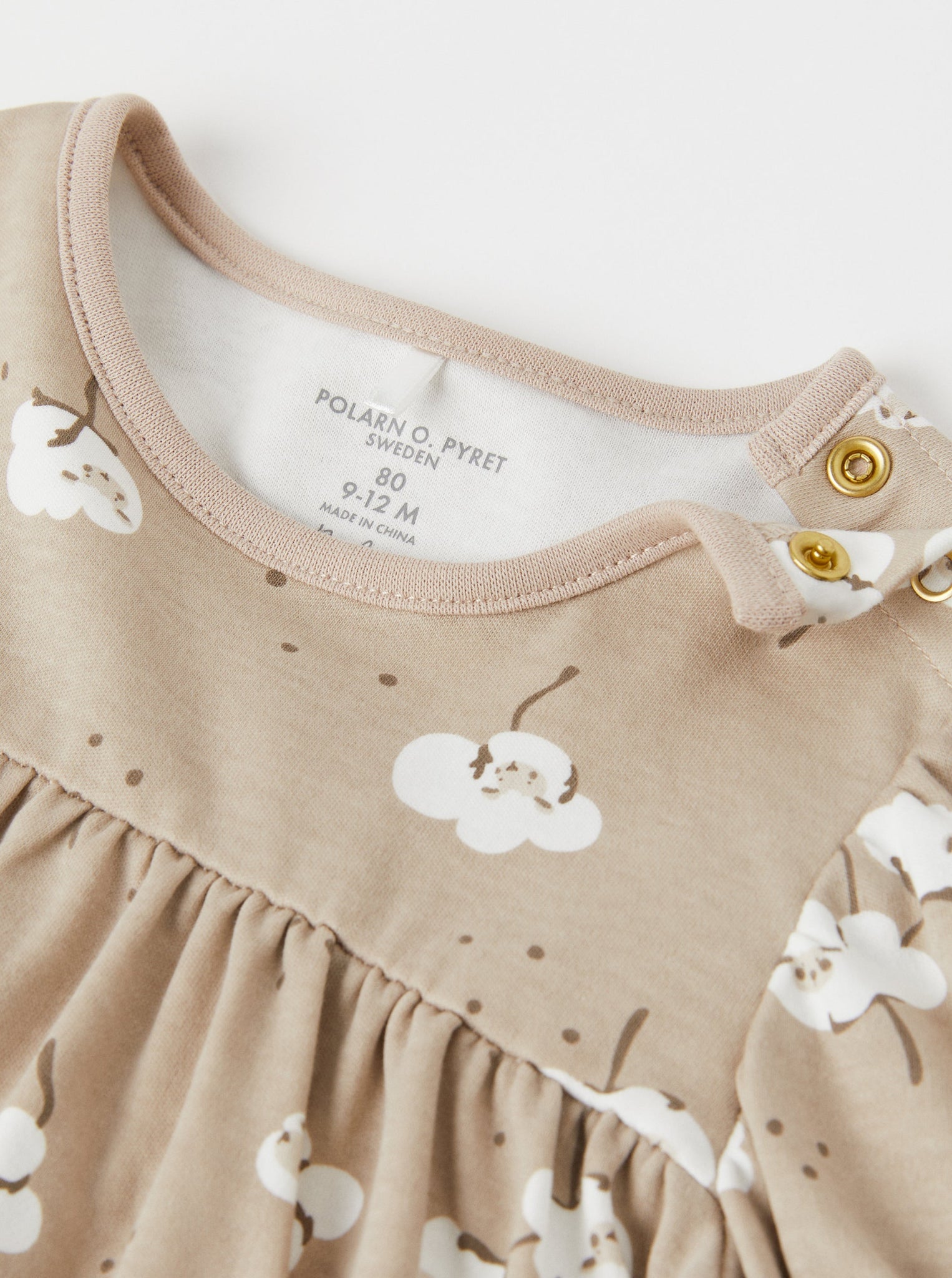 Sheep Print Beige Baby Dress from the Polarn O. Pyret babywear collection. The best ethical kids clothes