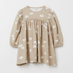 Sheep Print Beige Baby Dress from the Polarn O. Pyret babywear collection. The best ethical kids clothes