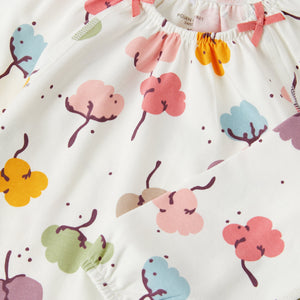 White Floral Print Baby Dress from the Polarn O. Pyret babywear collection. Clothes made using sustainably sourced materials.