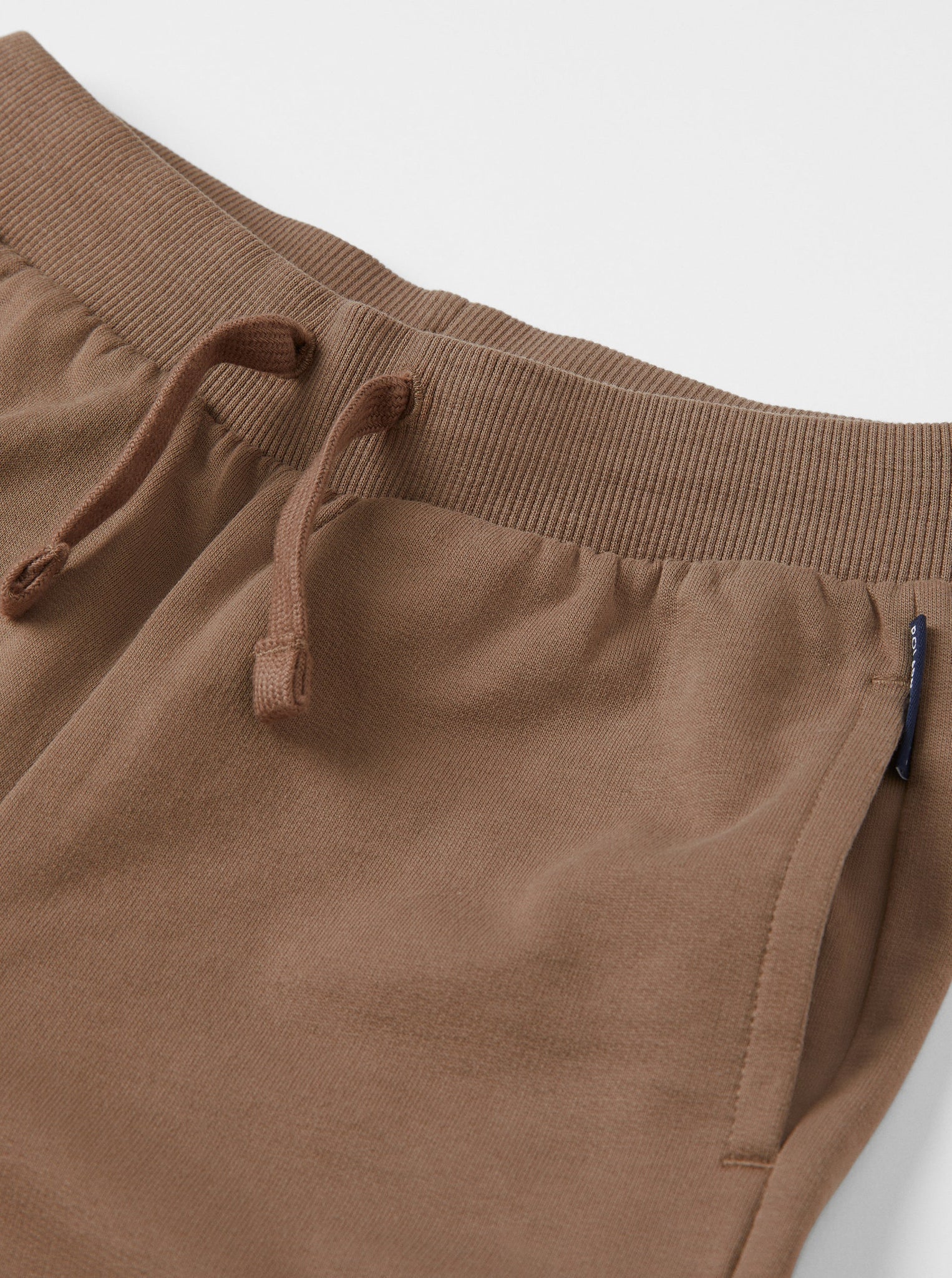 Organic Cotton Brown Kids Joggers from the Polarn O. Pyret kidswear collection. Clothes made using sustainably sourced materials.