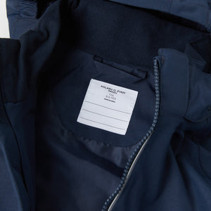 Kids Navy Shell Jacket from the Polarn O. Pyret outerwear collection. Ethically produced kids outerwear.