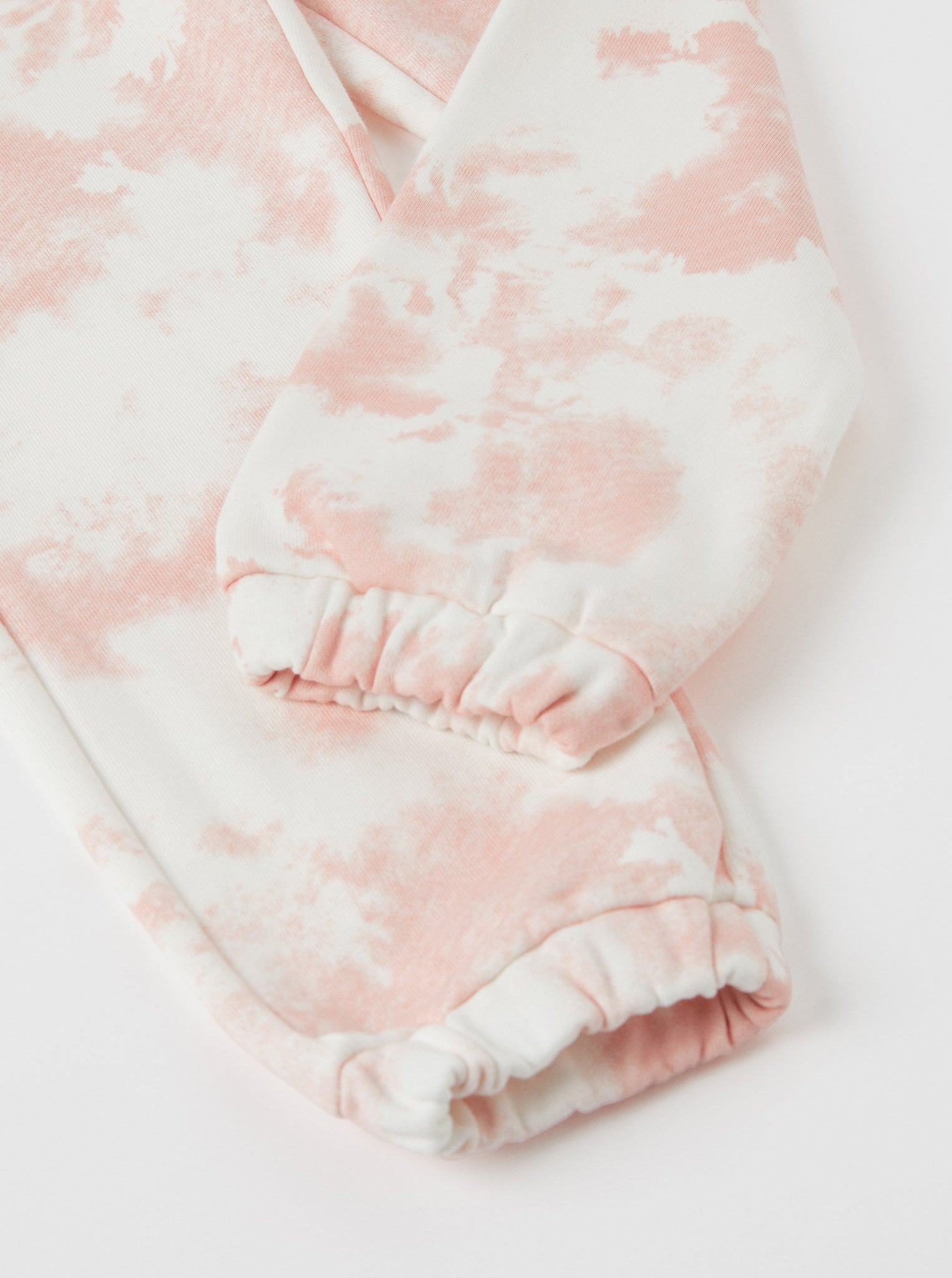 Tie-Dye Pink Kids Joggers from the Polarn O. Pyret kidswear collection. Ethically produced kids clothing.