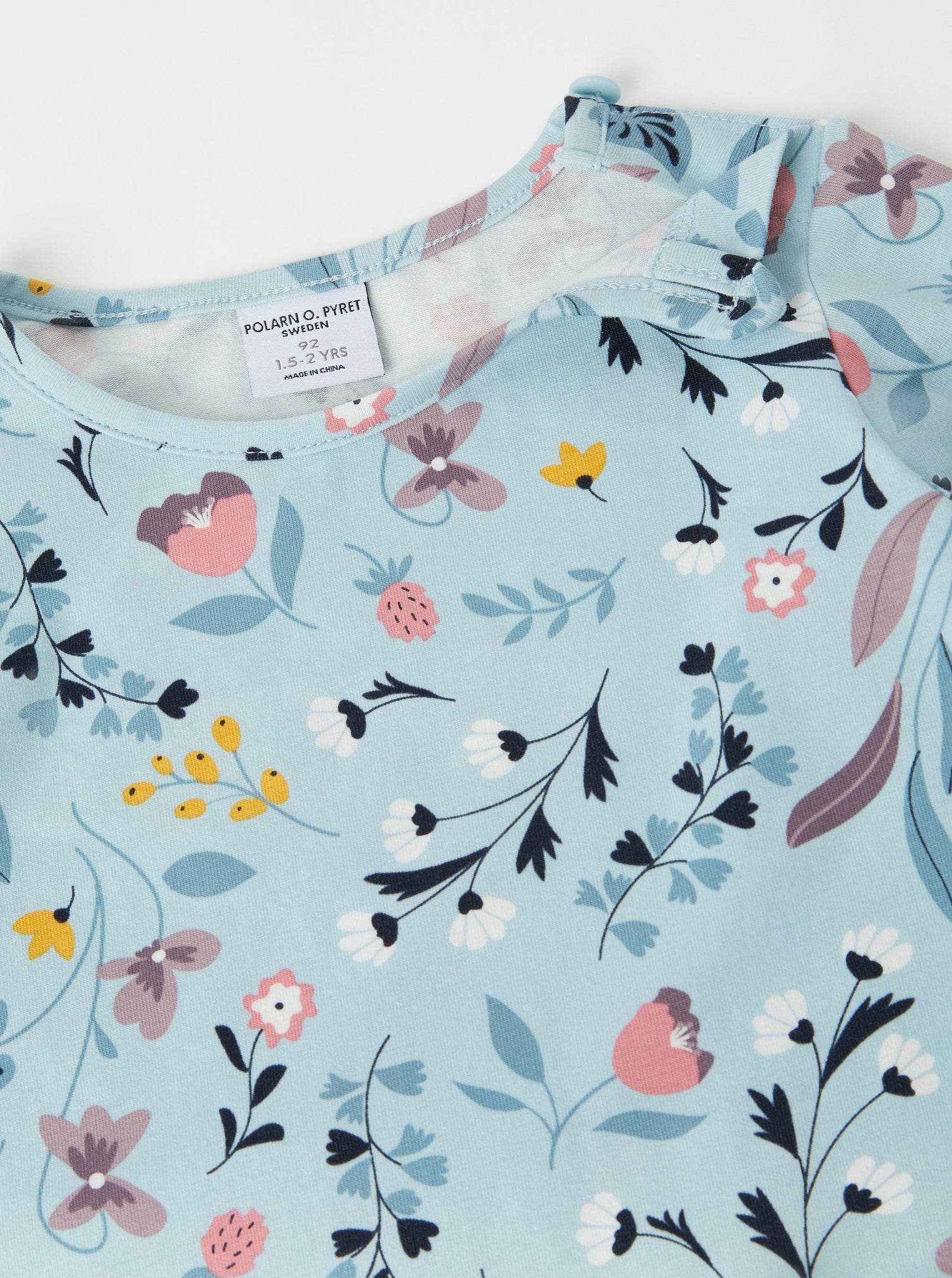 Organic Cotton Blue Floral Girls Top from the Polarn O. Pyret kidswear collection. Ethically produced kids clothing.