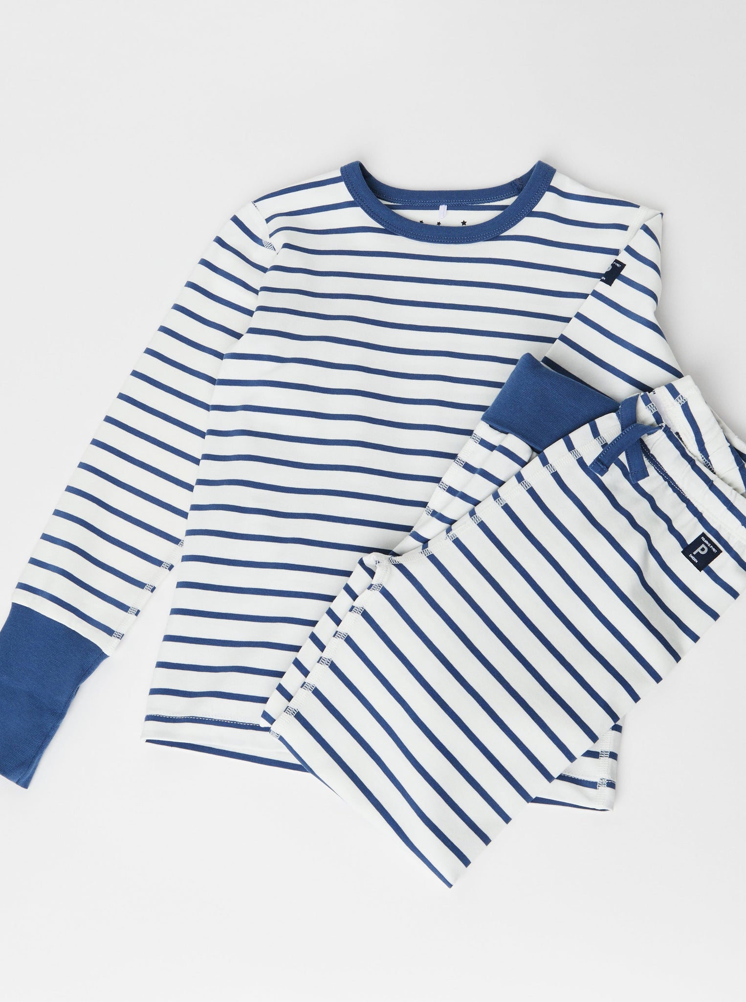 Organic Cotton Striped Kids Pyjamas from the Polarn O. Pyret kidswear collection. Nordic kids clothes made from sustainable sources.