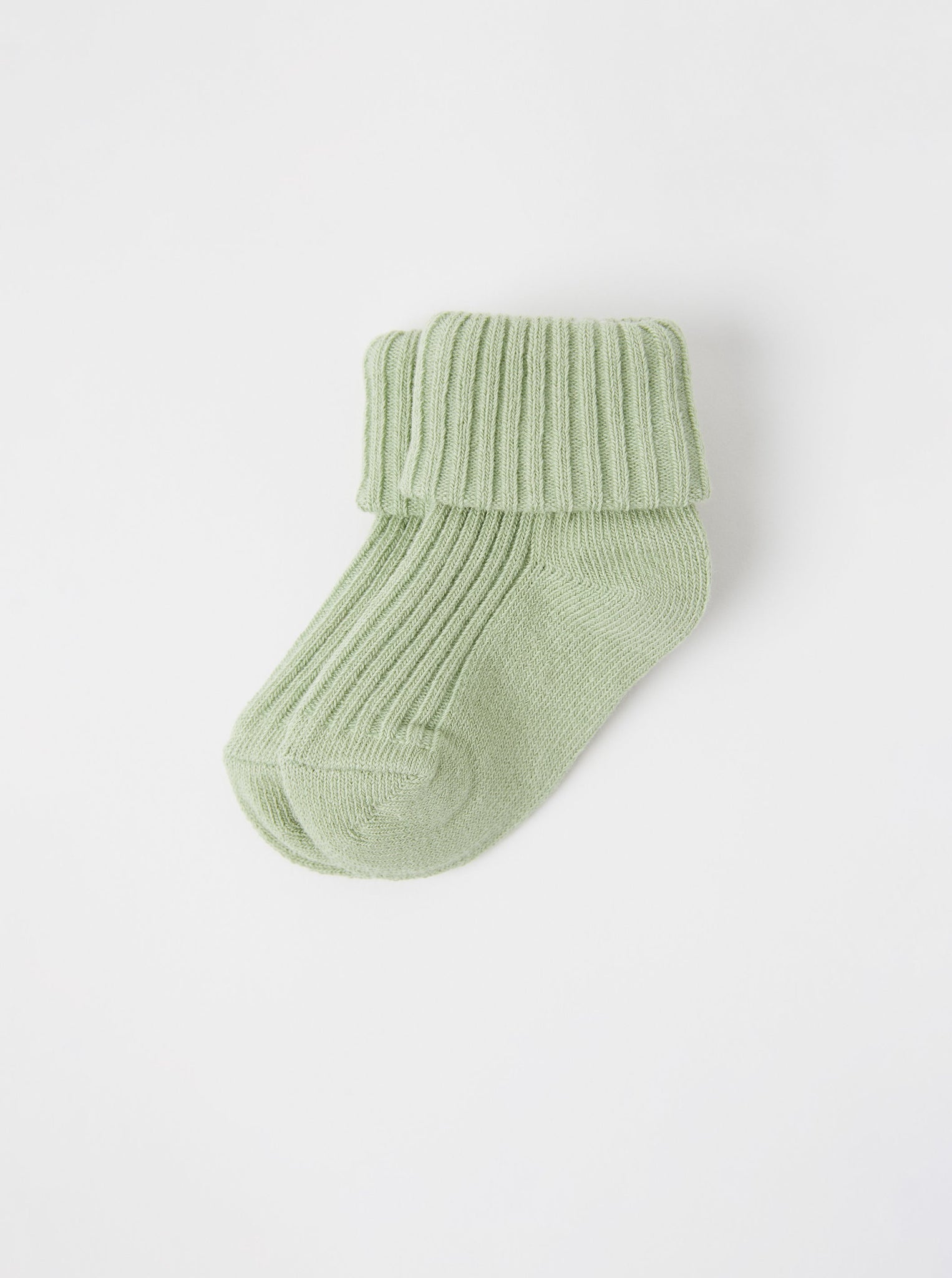 Organic Cotton Green Baby Socks from the Polarn O. Pyret babywear collection. Nordic kids clothes made from sustainable sources.