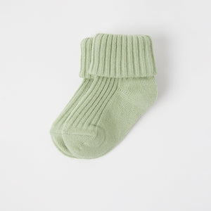 Organic Cotton Green Baby Socks from the Polarn O. Pyret babywear collection. Nordic kids clothes made from sustainable sources.