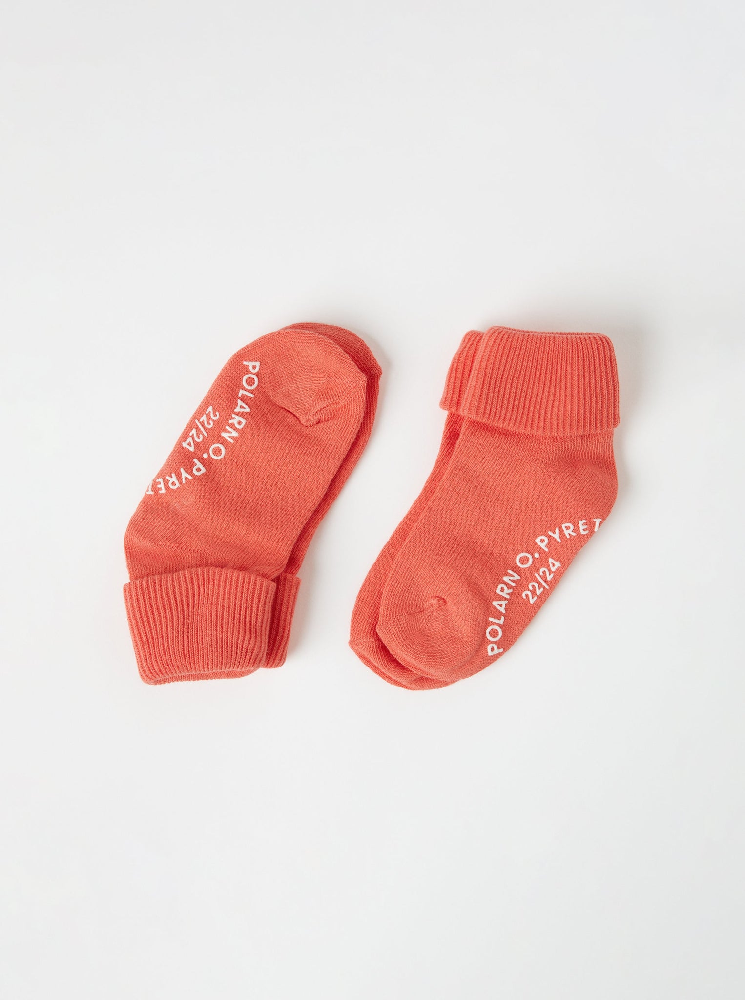 Two Pack Orange Antislip Kids Socks from the Polarn O. Pyret kidswear collection. Clothes made using sustainably sourced materials.