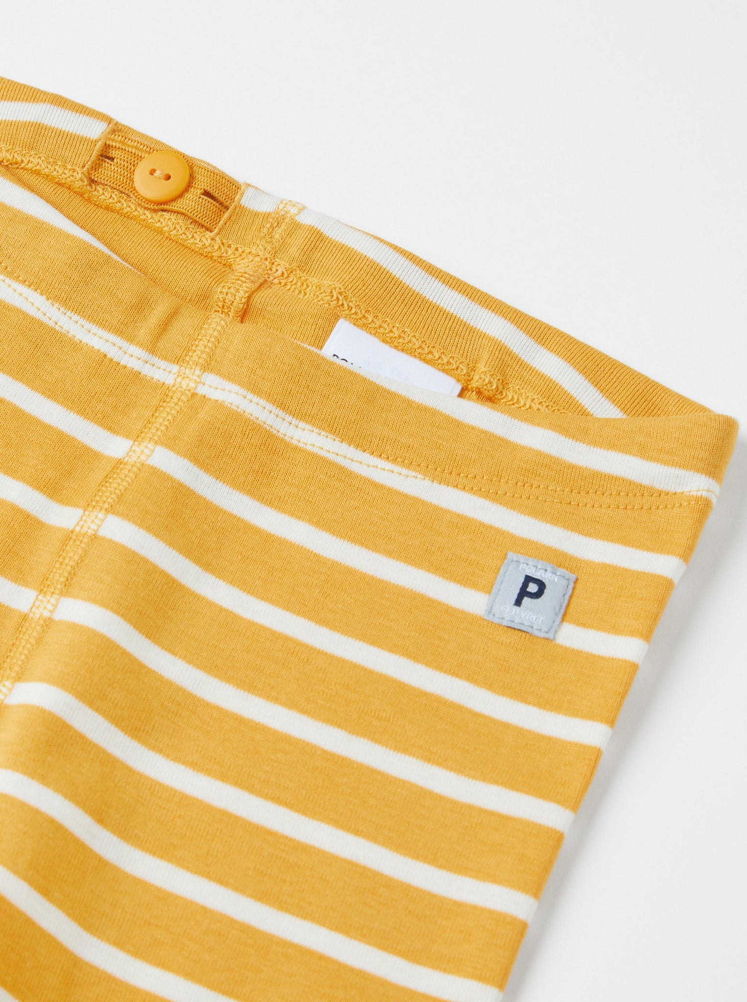 Organic Cotton Yellow Baby Leggings from the Polarn O. Pyret babywear collection. Clothes made using sustainably sourced materials.