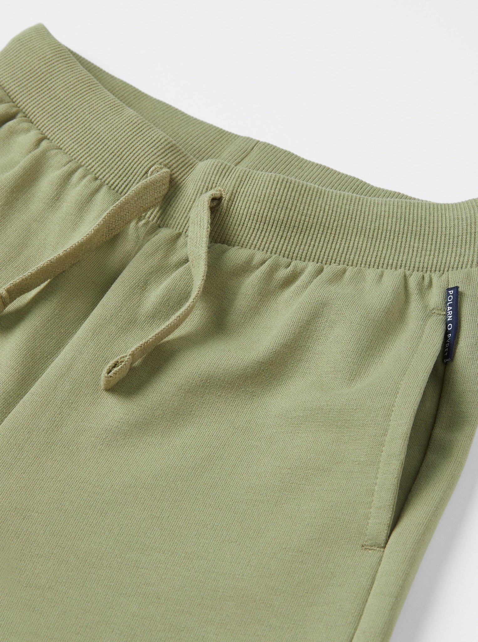Organic Cotton Green Kids Joggers from the Polarn O. Pyret kidswear collection. Ethically produced kids clothing.
