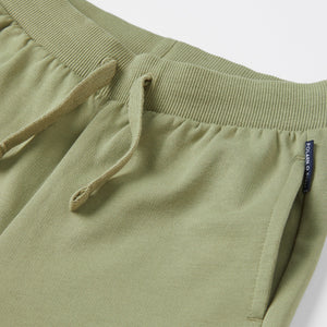 Organic Cotton Green Kids Joggers from the Polarn O. Pyret kidswear collection. Ethically produced kids clothing.