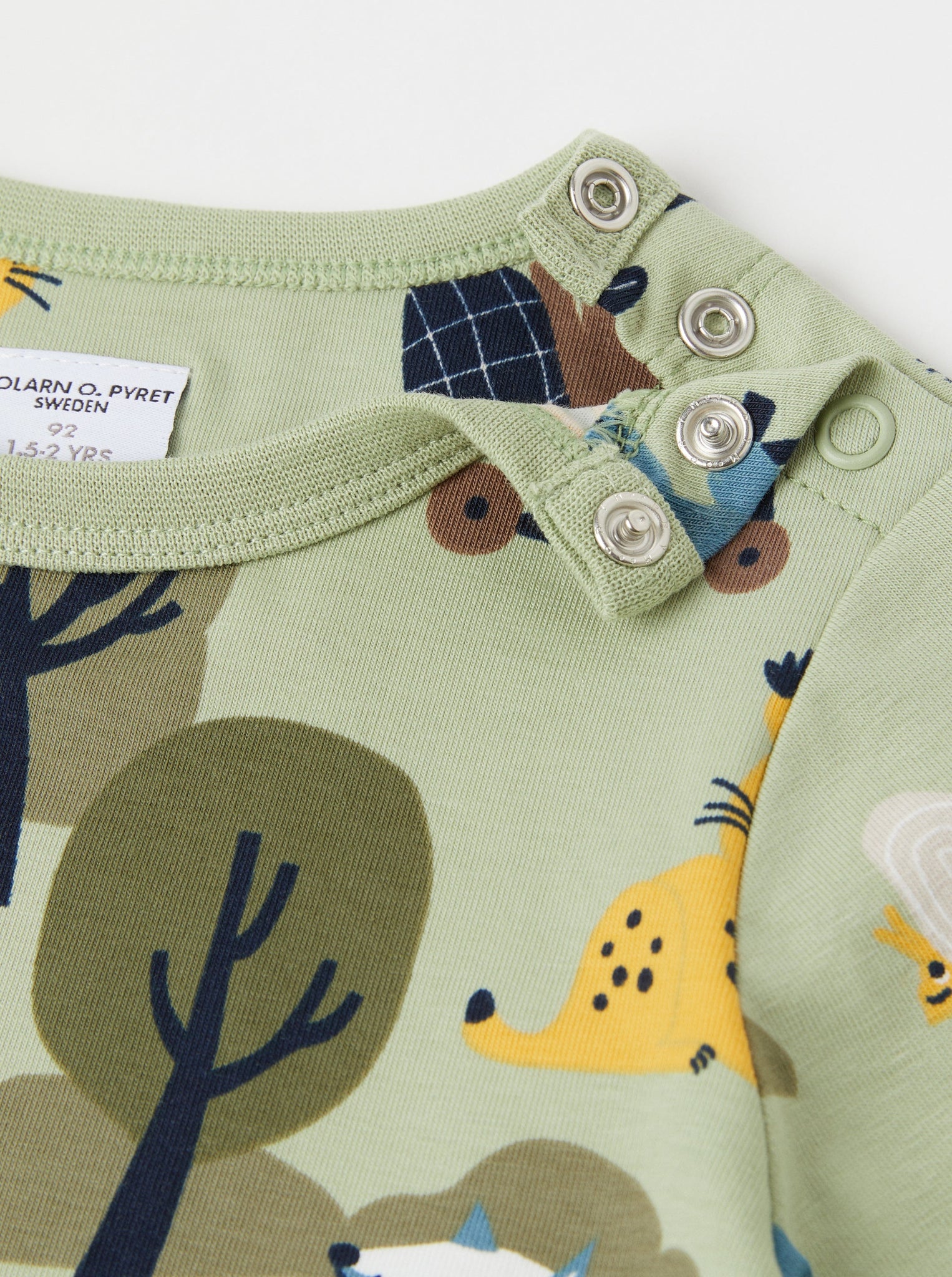Cotton Animal Print Green Kids Top from the Polarn O. Pyret kidswear collection. Ethically produced kids clothing.