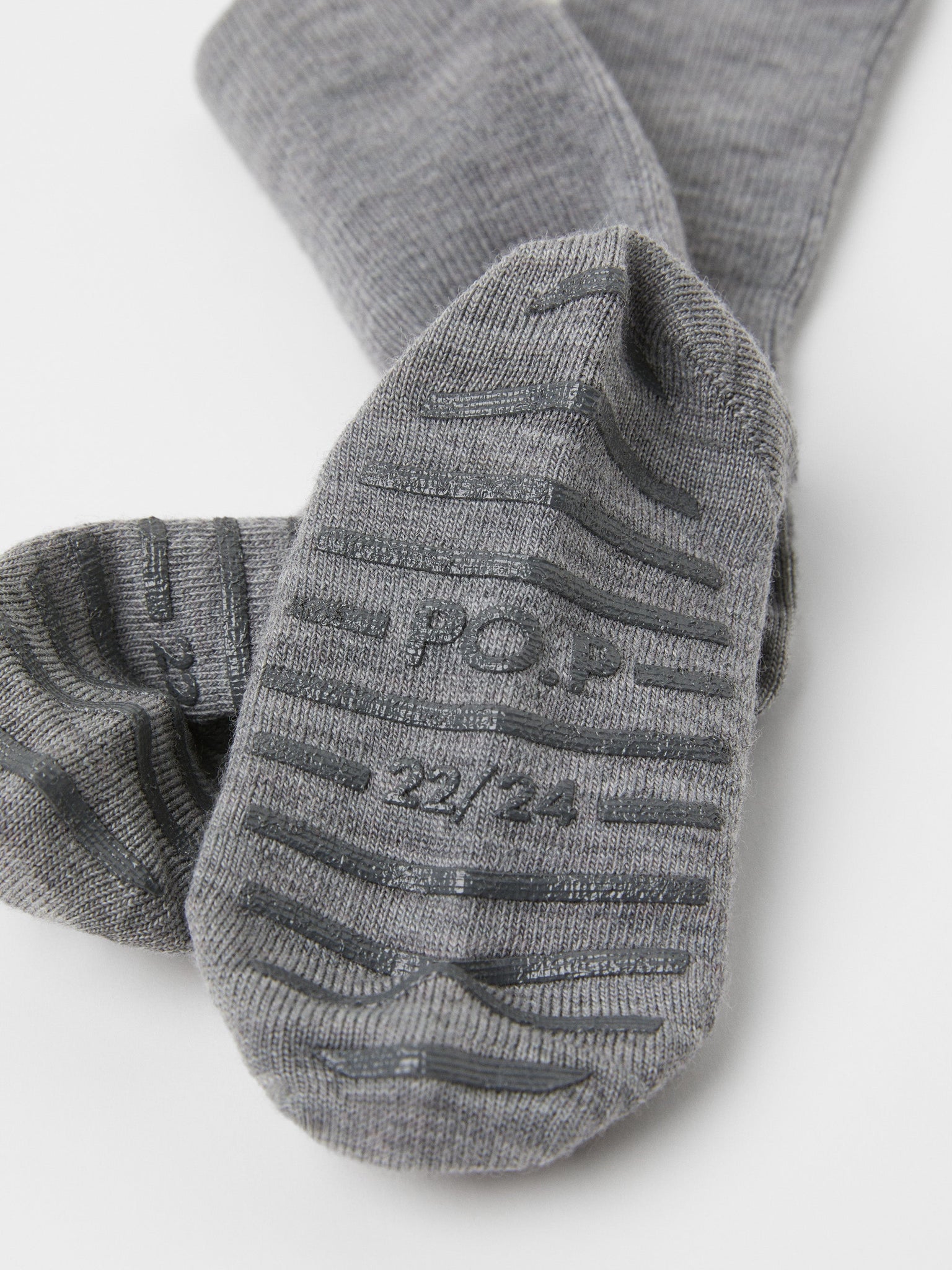 Merino Wool Grey Antislip Kids Socks from the Polarn O. Pyret kidswear collection. Nordic kids clothes made from sustainable sources.