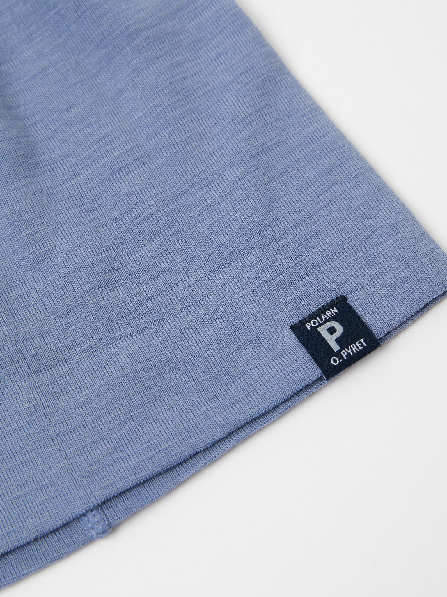 Merino Wool Blue Kids Beanie Hat from the Polarn O. Pyret outerwear collection. Made using ethically sourced materials.